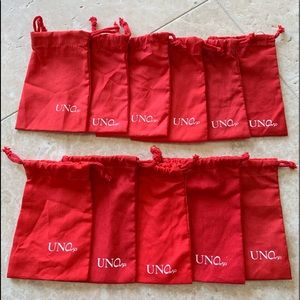 Lot of 11 MEDIUM size Uno De 50 duster bags